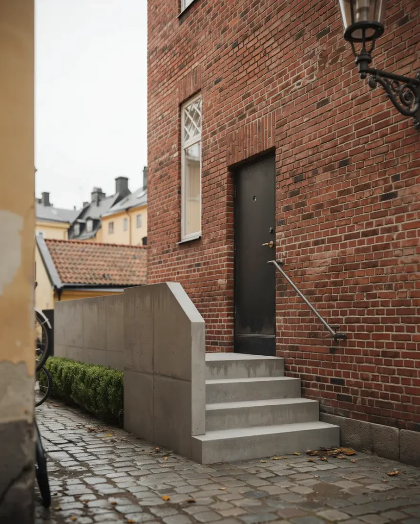 renovering av tegelfasad och murning av entr trappa p s dermalm